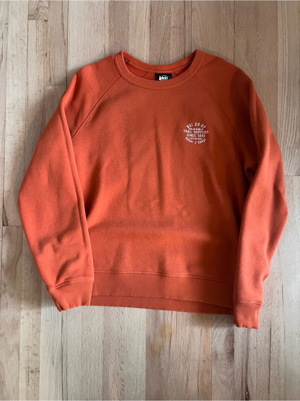 REI Men’s Burnt Orange Crew Sweatshirt with Small Chest Logo